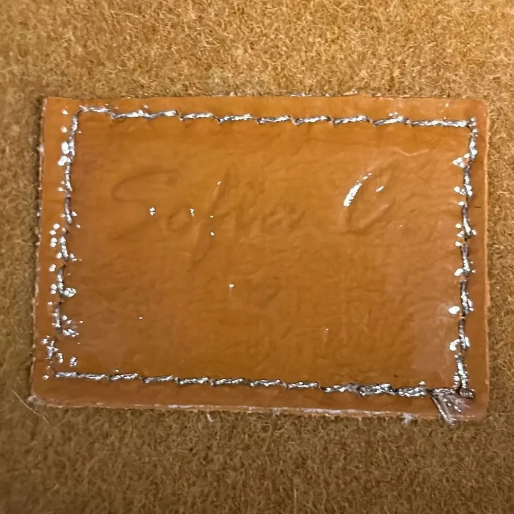 Sophia C. Mustard colored bag.